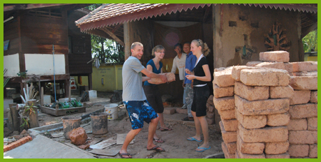 Building adobe house for Monk